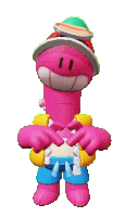 a pink cartoon character wearing a hat and shorts making a heart shape with his hands