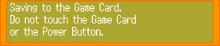 a screen that says " saving to the game card " on it