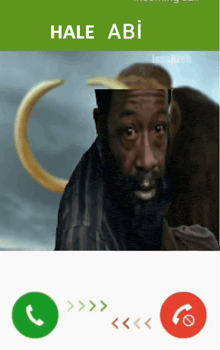 a man with a beard is talking on a phone with hale abi on the screen