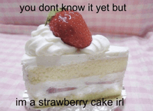 a slice of strawberry cake with whipped cream and a strawberry on top of it