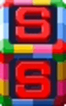 the letter s is written in red on a colorful block .