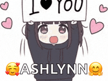 a girl holding up a sign that says i love you ashlynn