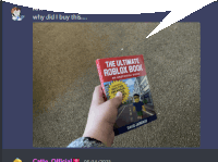 a person is holding up a book titled the ultimate roblox book