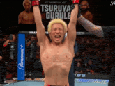 a man in a boxing ring with the word paramount on the corner