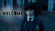 a girl in a school uniform with the words welcome behind her