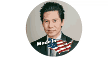 a man in a suit and tie is surrounded by an american flag and made in the usa