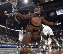 a basketball game is being played in a stadium with a miller lite ad in the background