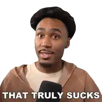 a man says that truly sucks while talking into a microphone