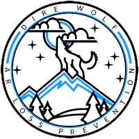 a logo for dire wolf loss prevention has a wolf howling at the moon