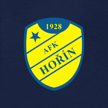 a yellow and blue shield with the year 1928 on top