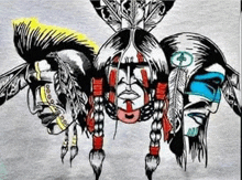 a drawing of three native american heads with feathers on them