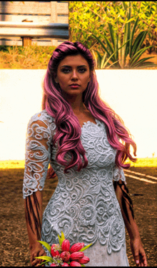 a woman with pink hair is wearing a white dress and holding a bouquet of flowers