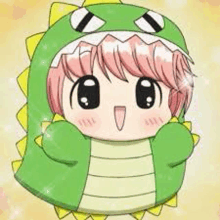 a cartoon girl is wearing a green dinosaur costume .