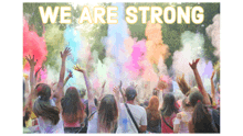 a poster that says we are strong with a crowd of people raising their hands