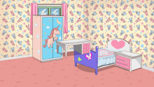 a girl 's bedroom with a unicorn on the wardrobe