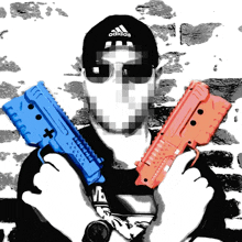 a man wearing an adidas hat is holding two guns in his hands