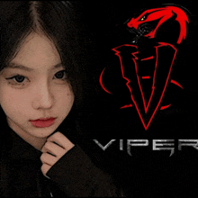 a girl with a viper logo in the background