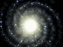 a spiral galaxy with a white center and lots of stars