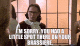 a woman wearing glasses says i 'm sorry you had a little spot there on your brasier .