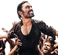a man in a black shirt is being lifted by a crowd of people