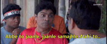 a man in a red shirt is talking to another man with the words abbe to jaanle