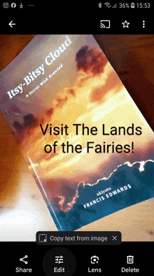 a book titled visit the lands of the fairies is on a table