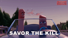 two sausages are driving a car with the words savor the kill below them