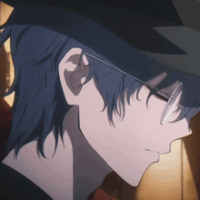 a close up of a person wearing a hat and glasses