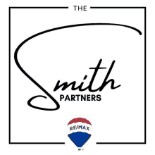 the logo for the smith partners is a black and white logo with a re / max hot air balloon .