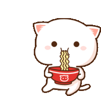 a white cat is eating noodles from a red bowl with a bear on it