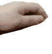 a close up of a person 's hand with their fingers crossed .