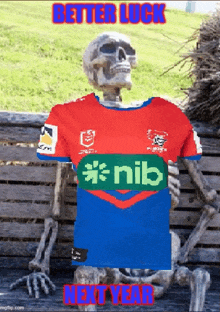 a skeleton is sitting on a bench wearing a red and blue nib shirt