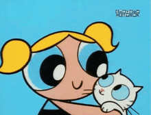bubbles from the powerpuff girls is hugging a white cat