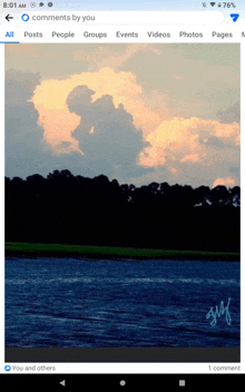 a screenshot of a facebook page showing a picture of a cloudy sky over a body of water