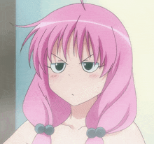 a girl with pink hair has a very angry look on her face