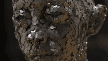 a 3d rendering of a face made of metal pieces