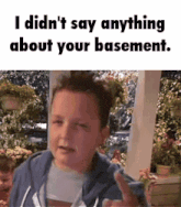 a young boy giving a thumbs up with the words " i didn 't say anything about your basement "
