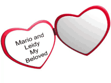 a heart shaped mirror with mario and leidy my beloved on it