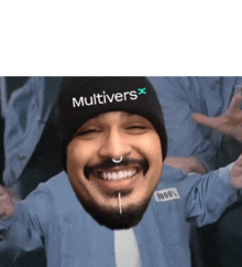 a man with a beard wearing a hat that says multivers x