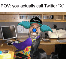 a man in a clown costume sits in front of a computer with the caption " pov : you actually call twitter "