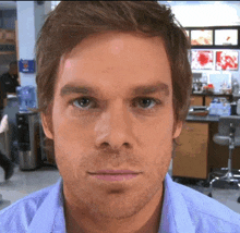 a close up of a man 's face in a kitchen