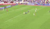 a soccer player with the number 7 on his shirt is laying on the ground