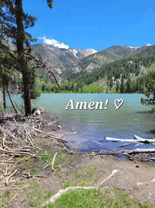 a picture of a lake with mountains in the background and the words amen on the bottom