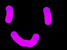 a purple smiley face is glowing in the dark .