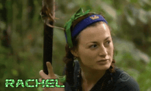 a woman with a green headband and the name rachel