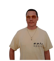 a man wearing sunglasses and a t-shirt that says " cali sport "