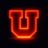 the letter u is glowing bright red in the dark