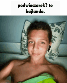 a shirtless boy is laying on a bed with a pillow and the words podwieczorek to bailando