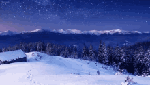 a snowy mountain landscape with a cabin in the foreground