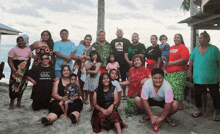 a group of people are posing for a picture with one wearing a canterbury shirt